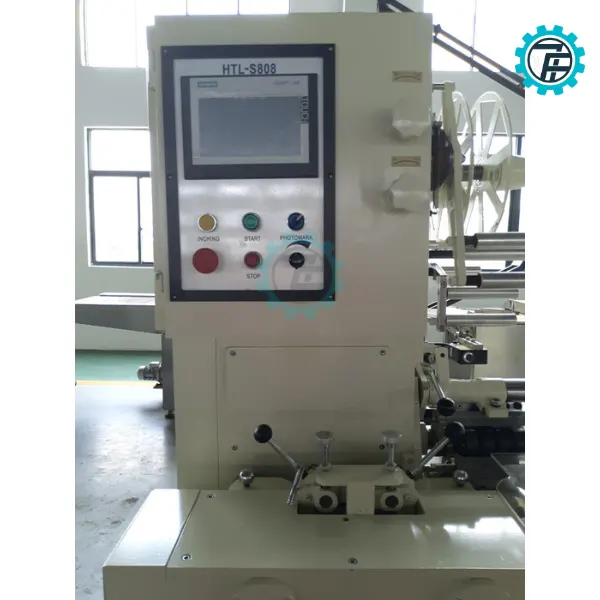 ម៉ាស៊ីនវេចខ្ចប់ស្ករគ្រាប់បង្វិល ២ក្បាល 8 May dong goi keo xoan 2 dau 03