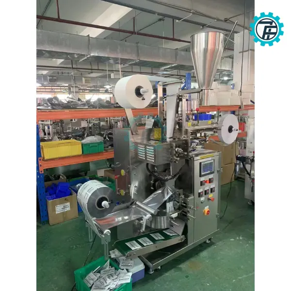 ម៉ាស៊ីនវេចខ្ចប់តែខ្ចប់មានកាបូ 8 may dong goi tra tui loc 02