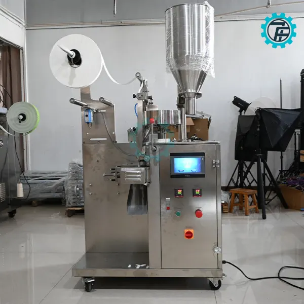 ម៉ាស៊ីនវេចខ្ចប់តែ YS-10 10 may dong goi tra tui loc YS 10 01 1