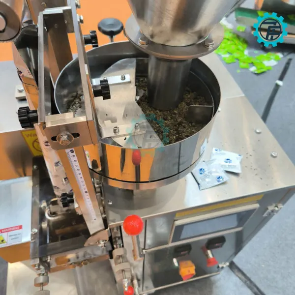 ម៉ាស៊ីនវេចខ្ចប់តែ YS-10 12 may dong goi tra tui loc YS 10 05