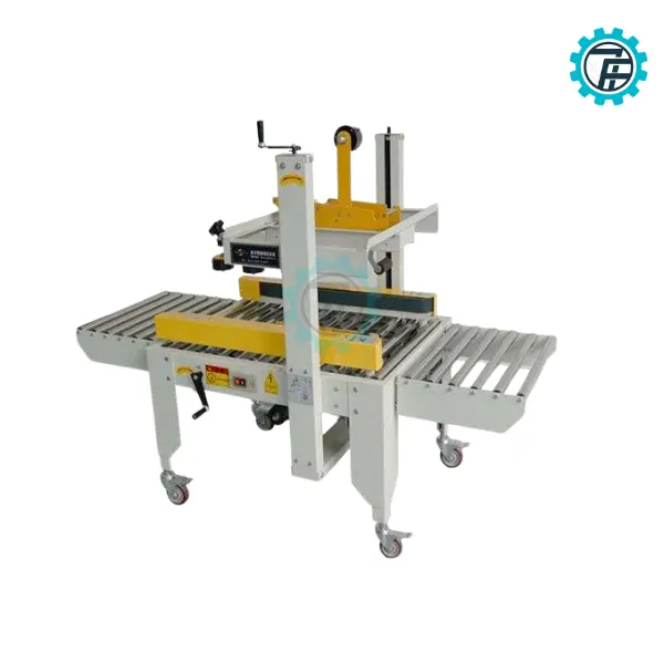 ម៉ាស៊ីនបិទកាសែតប្រអប់កាតុង FXJ-6050 13 May dan bang dinh thung carton FXJ 6050 01