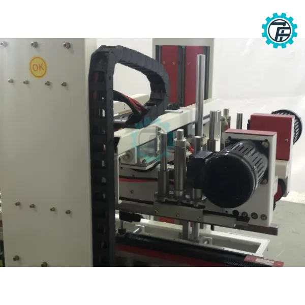 ម៉ាស៊ីនបិទភ្ជាប់ក្រដាសកាតុងធ្វើកេស FXS-5050 10 May dan bang dinh thung carton fxs 5050 01