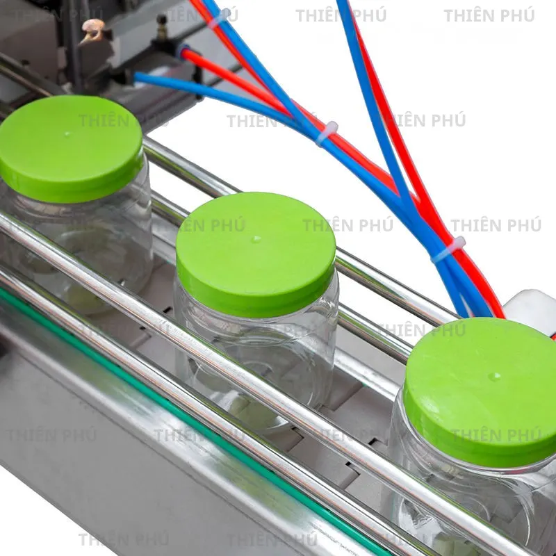 May dong nap chai tu dong QDX 1 3